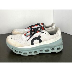 On Running White and Light Blue Athletic Shoes